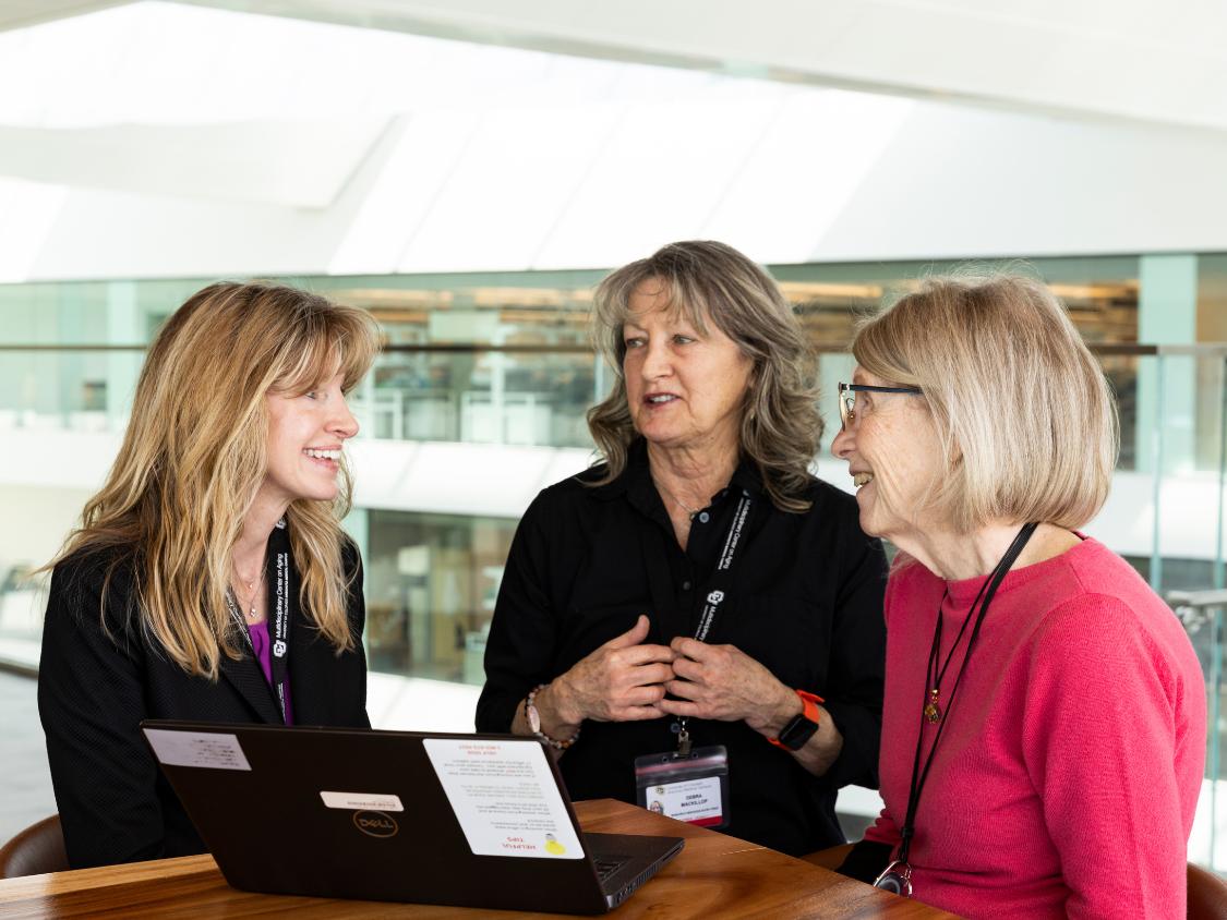 Dr. Kady Nearing and Older Adult Research Specialist program members chat.