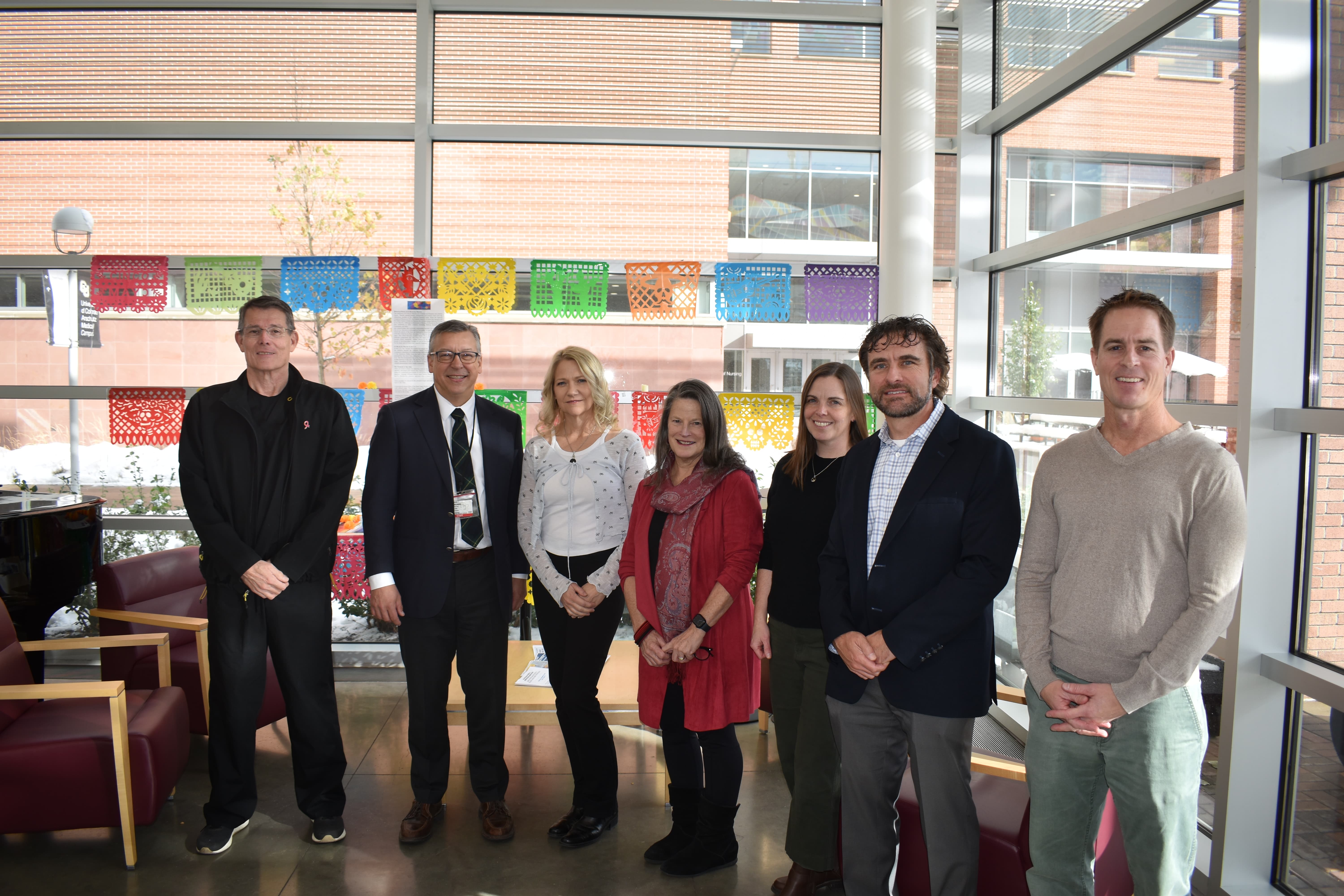 Photo of faculty members inside the Fulginiti Building