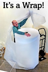 David Weil with huge roll of foam wrap