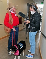 Jude Gassaway and Bandit, being interviewed by Claire Crawford