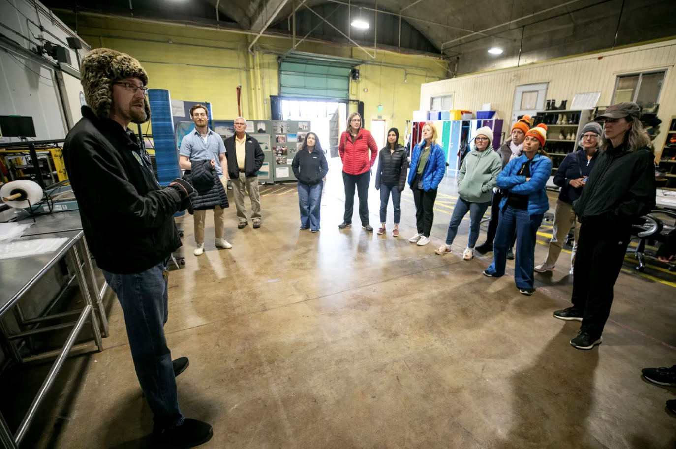 Teacher speaking with students