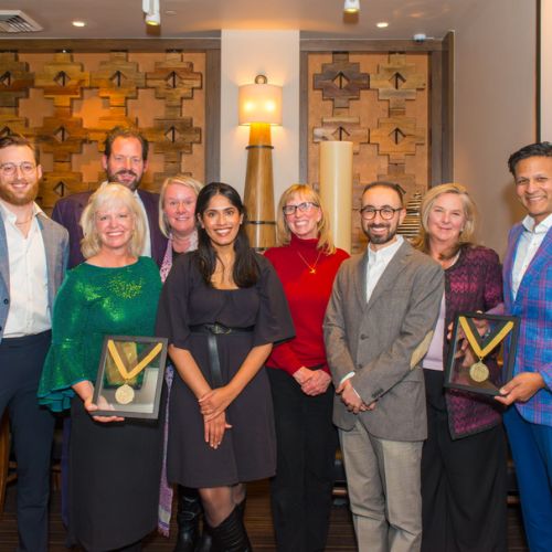 Attendees pose for a picture during the Climate and Health Foundation Endowed Chair in Climate Medicine celebratory event.