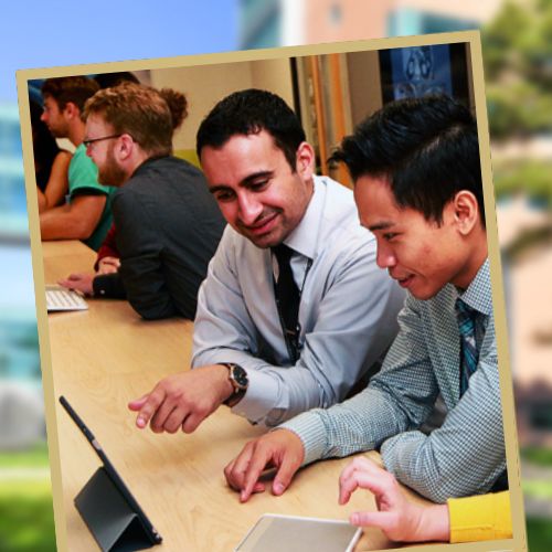 Faculty members collaborate on radiology images shared on a computer screen.