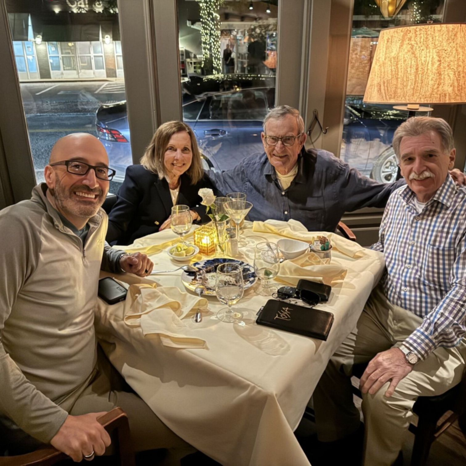 A group of people sitting at a table