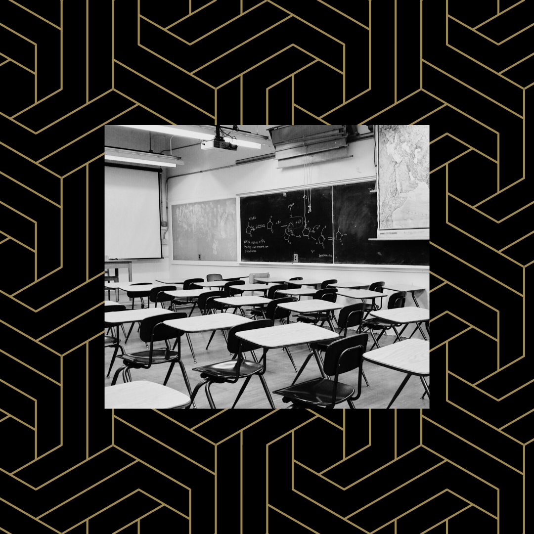 Black and white image of empty seats in a classroom over a black and gold geometric background.