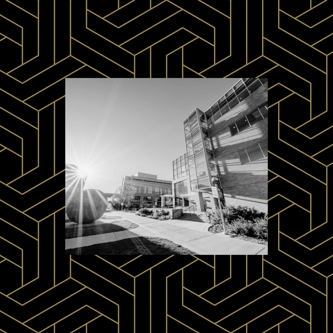 Black and white image of the education buildings at CU Anschutz over a black and gold geometric pattern