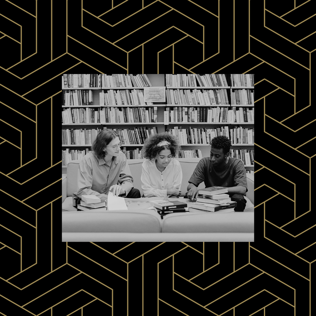 Black and white image of three students in a library over a black and gold geometric background.