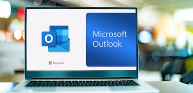 computer showing the Outlook logo on the screen