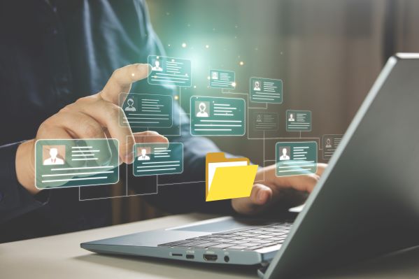 Image of a hand selecting a virtual computer file.